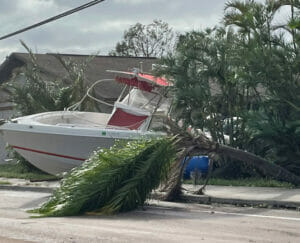 Boat and debris on Cape Coral Parkway
